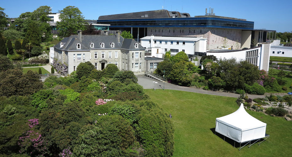 View of Tremough House looking over the grounds, with the Exchange Building in the background